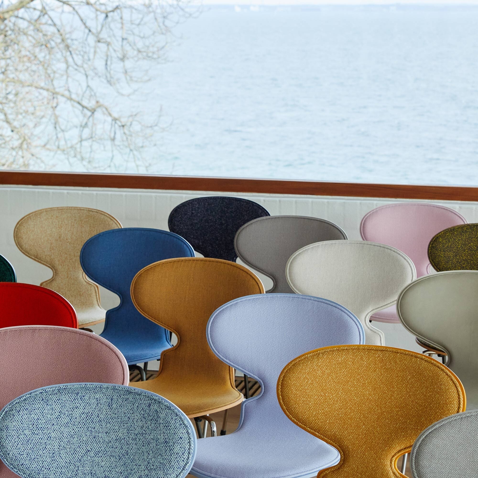 Ant™ Chair Front Upholstered Chromed Base