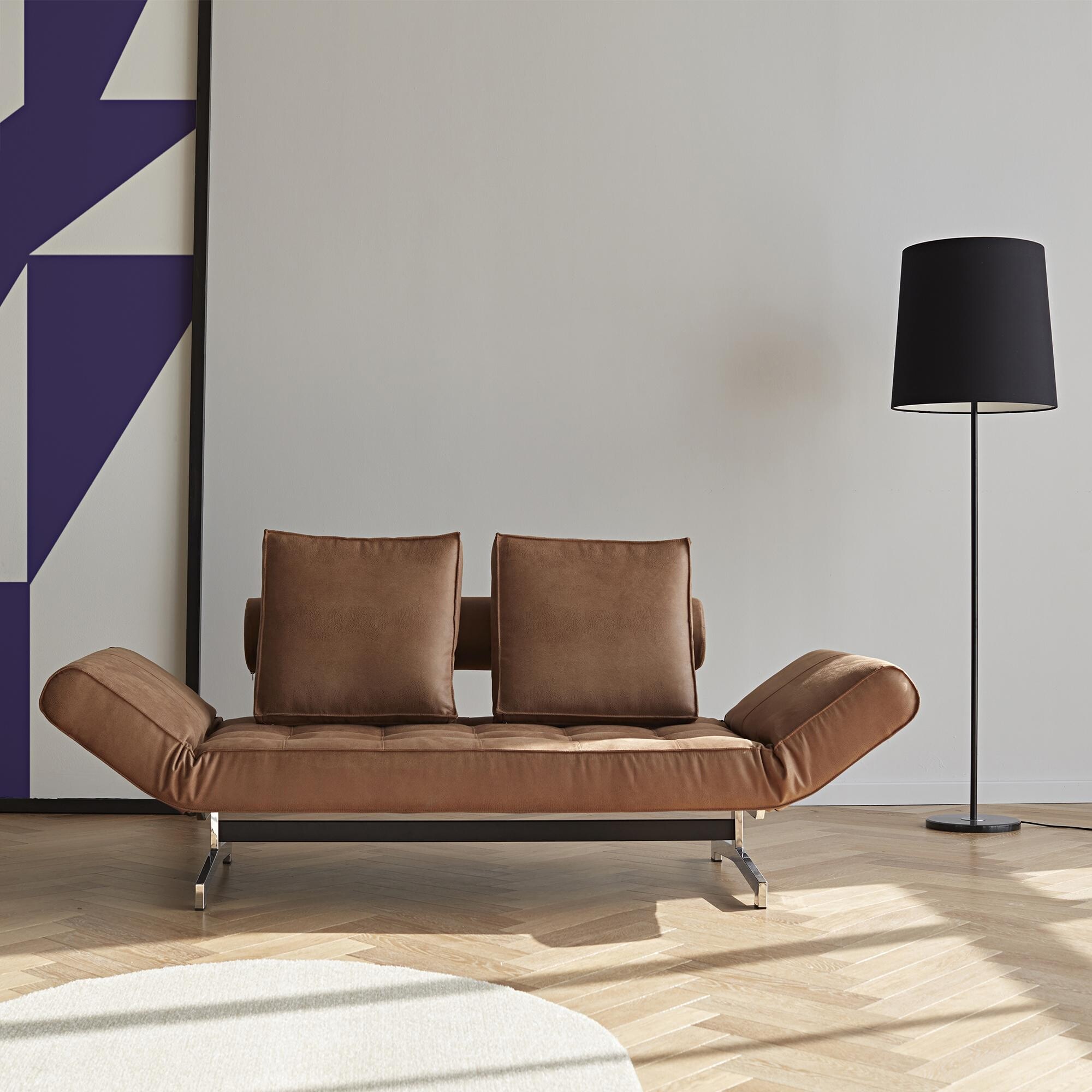 Ghia Sofa Bed Fabric with Leather Legs Chromed Steel