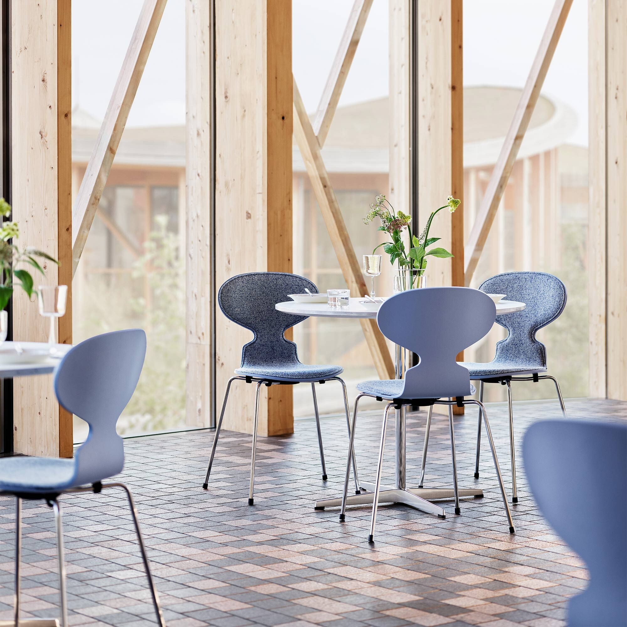 Ant™ Chair Front Upholstered Chromed Base