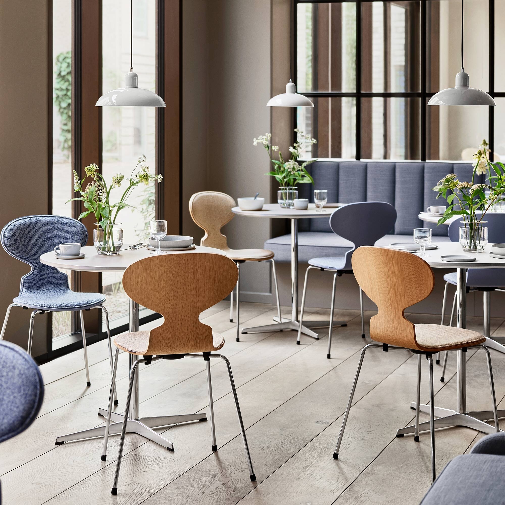 Ant™ Chair Front Upholstered Chromed Base