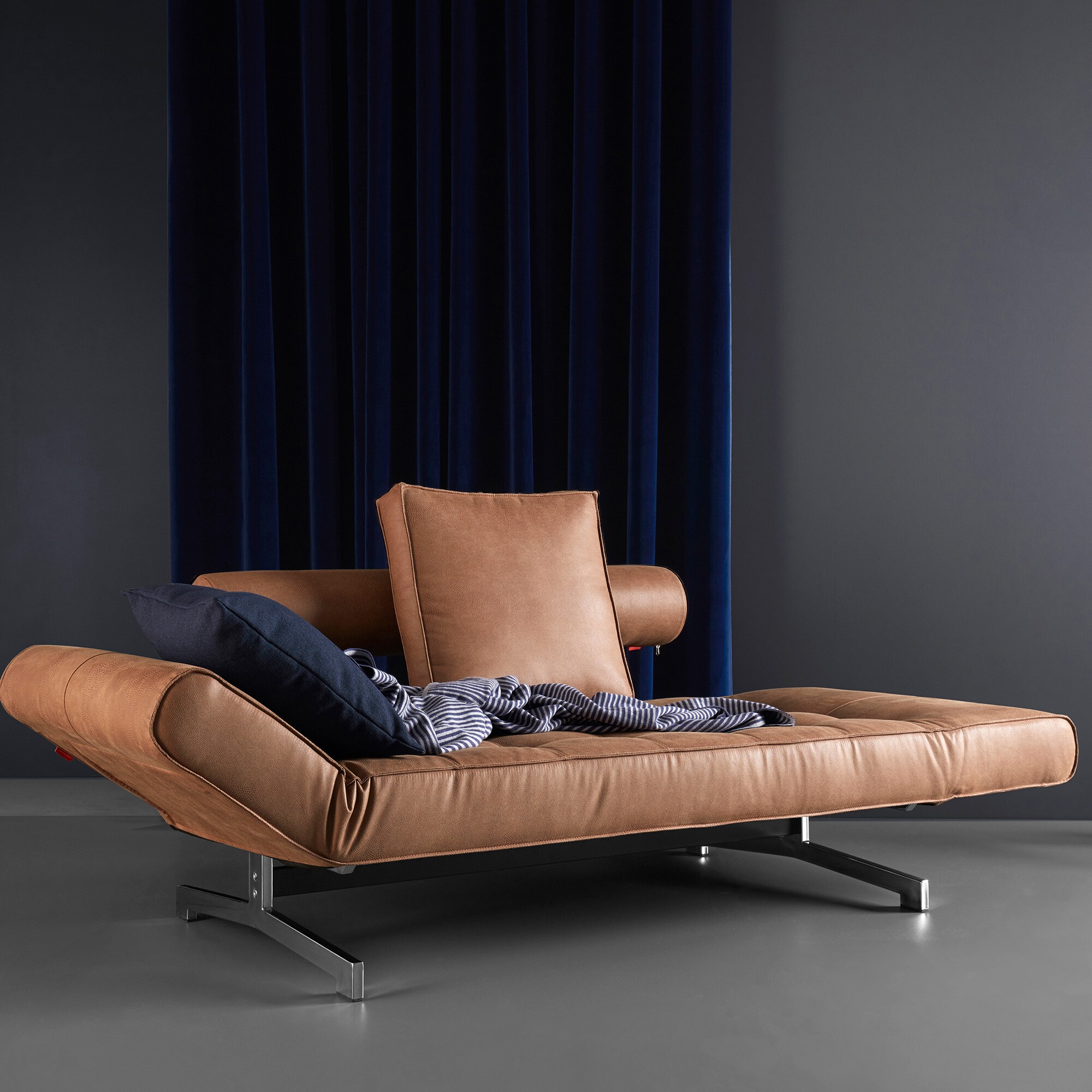 Ghia Sofa Bed Fabric with Leather Legs Chromed Steel