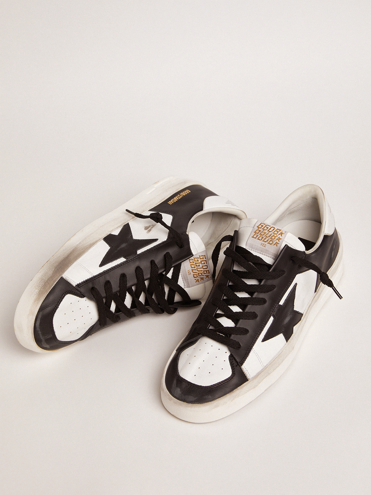 Women's Stardan sneakers in black and white leather| Golden Goose
