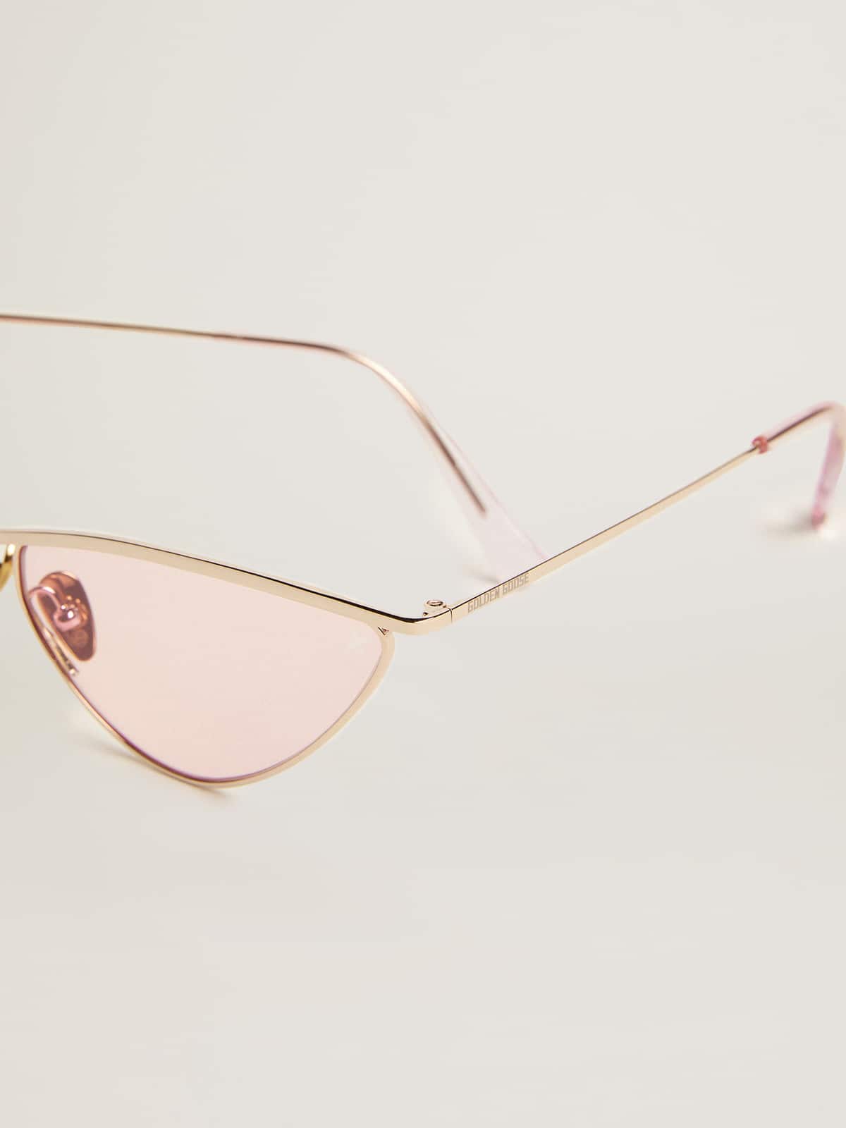 Sunframe cat-eye style with pink frame and lenses| Golden Goose