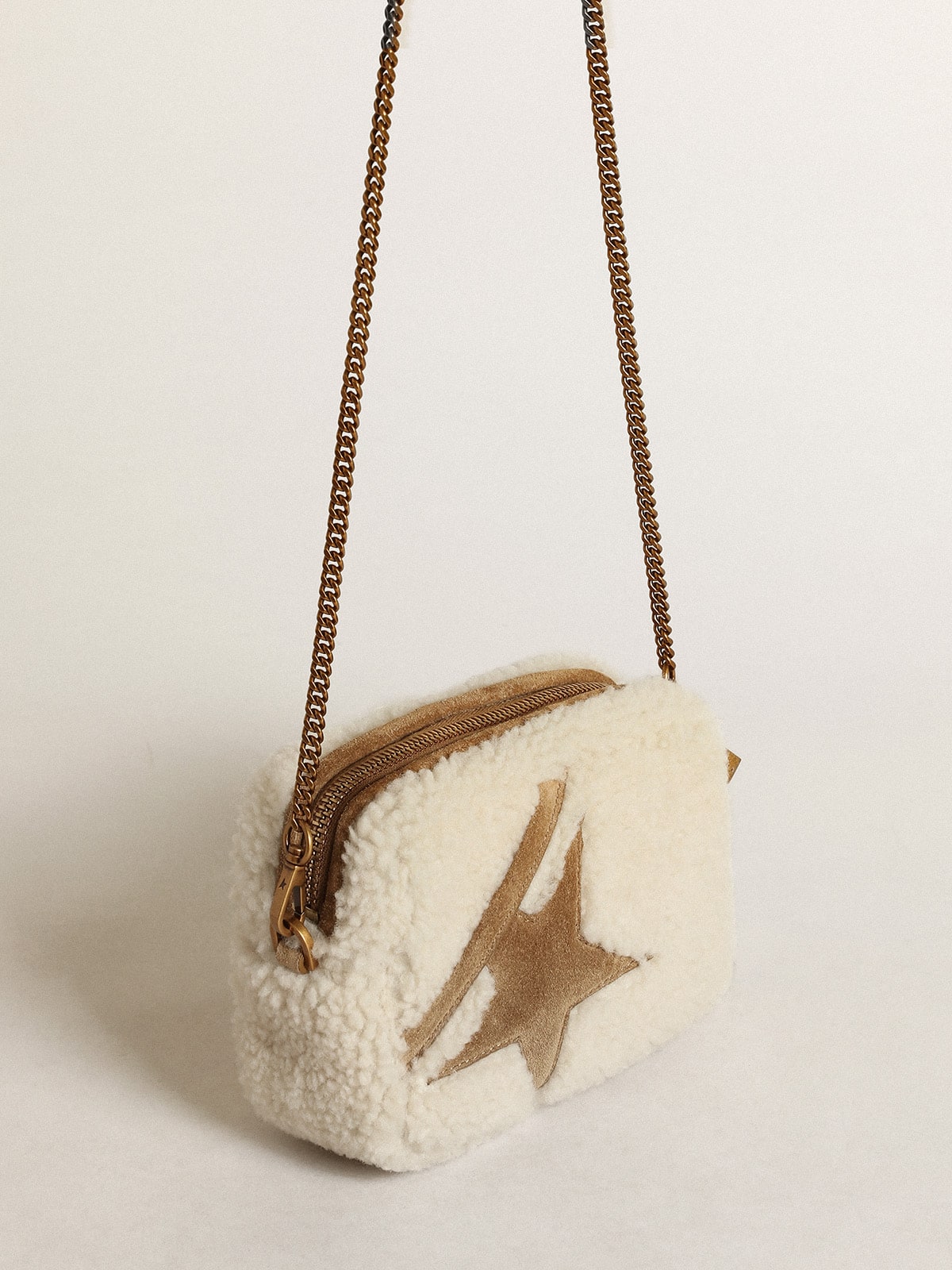 Mini Star Bag in beige shearling with suede star| Golden Goose