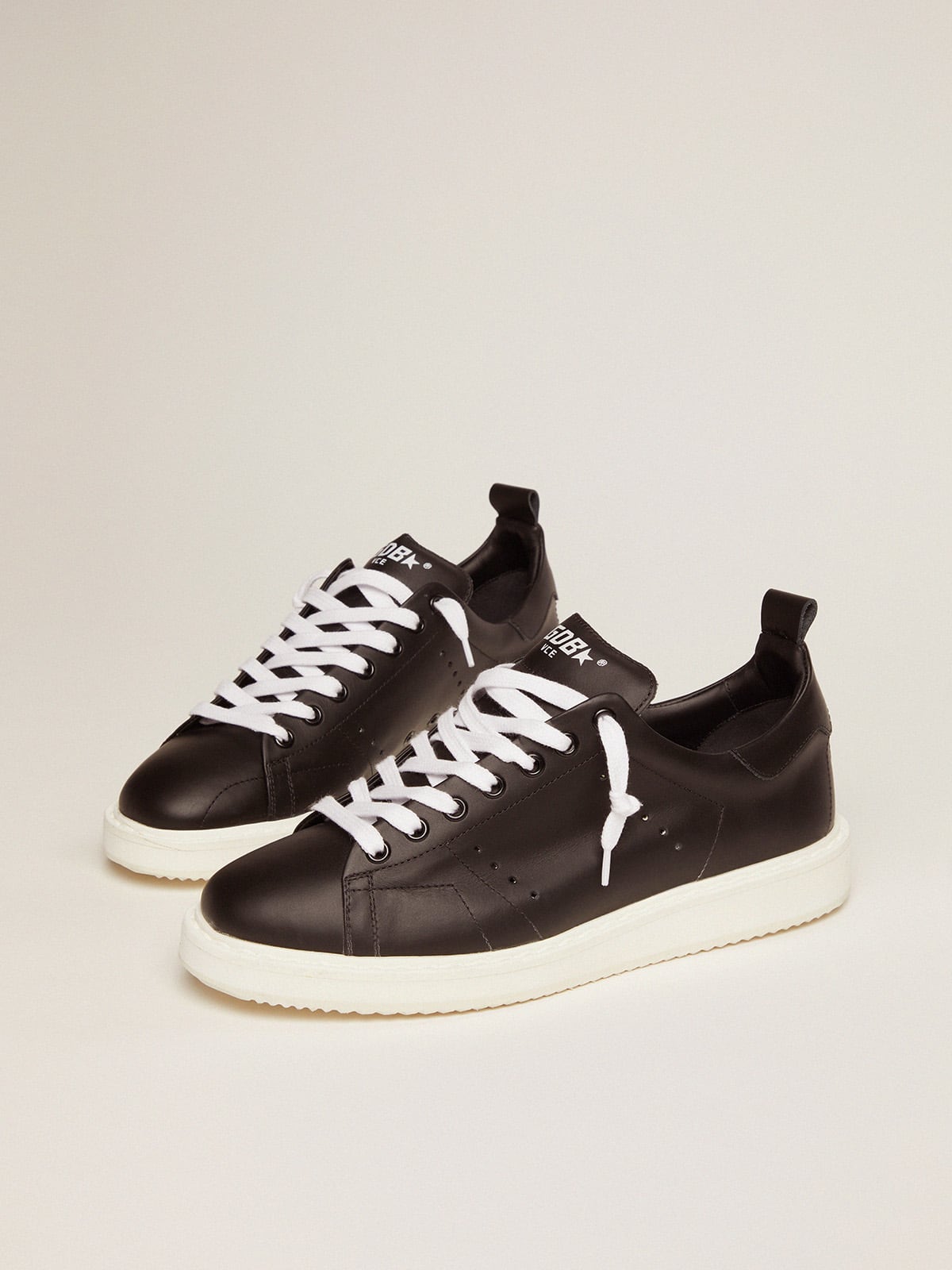 Starter sneakers in total black leather| Golden Goose