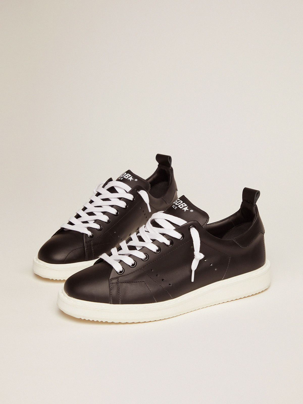 Starter sneakers in total black leather| Golden Goose