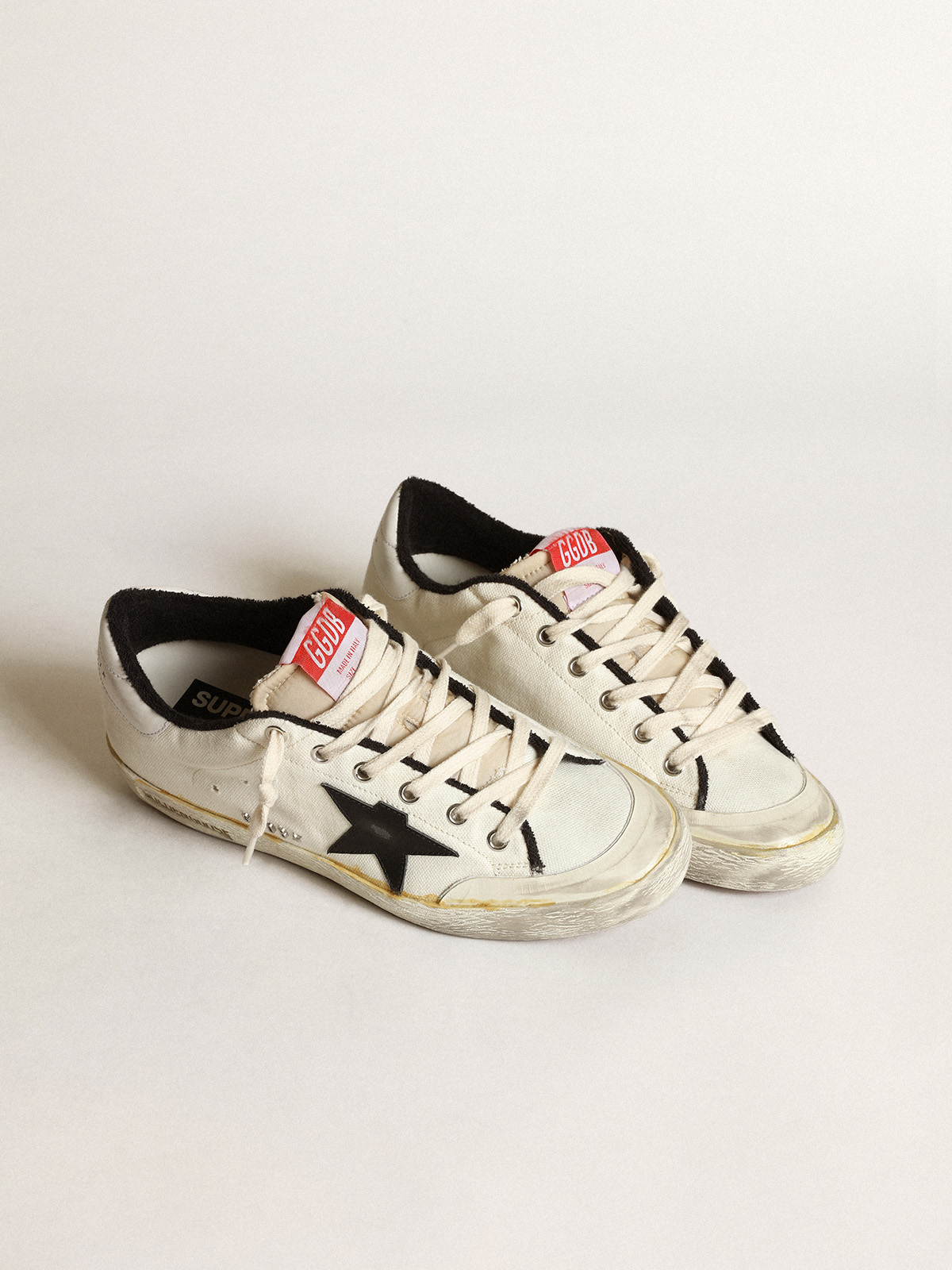 Women's Super-Star LTD in beige canvas with black star| Golden Goose