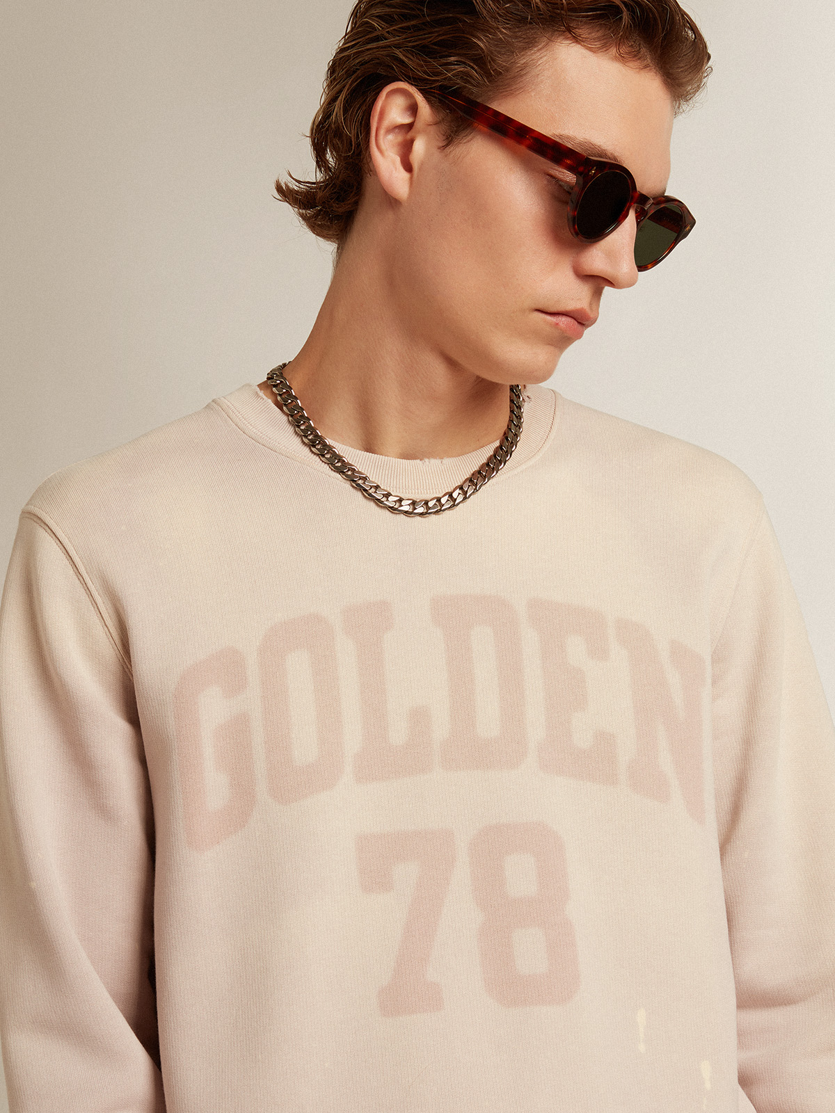 Distressed-finish pale pink sweatshirt| Golden Goose