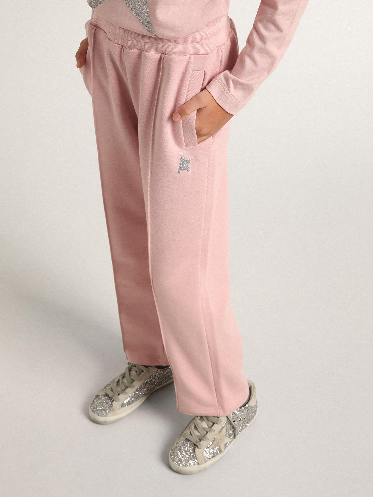 Pink joggers with glitter star on the front| Golden Goose