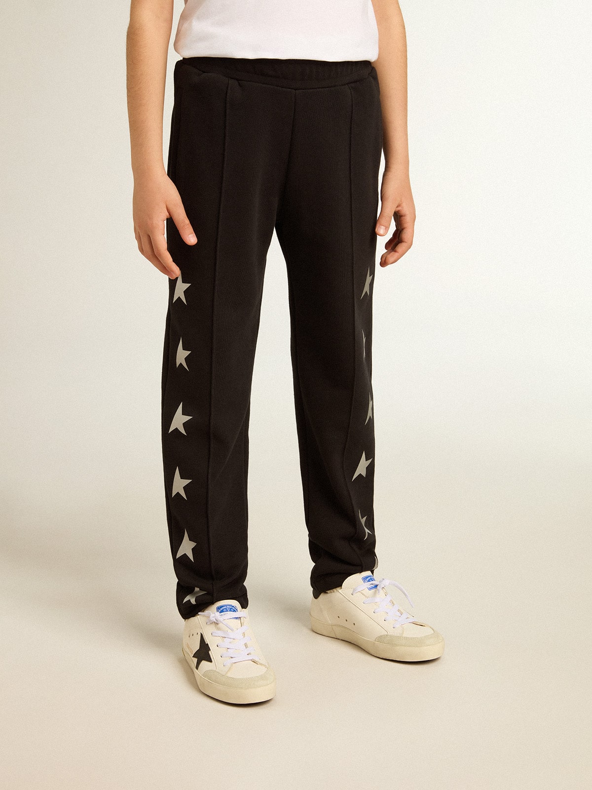 Boys' black joggers with white stars| Golden Goose