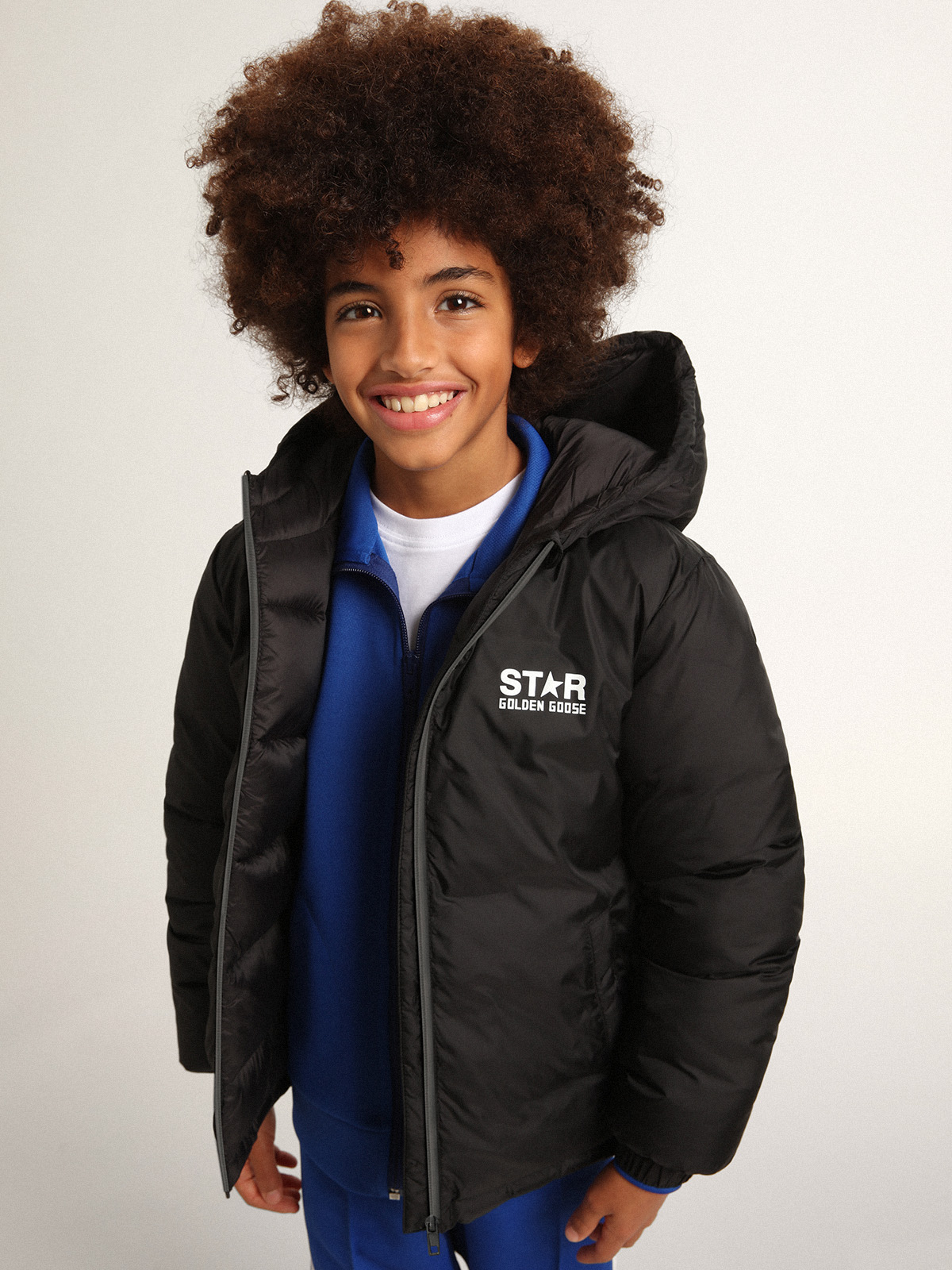 Black jacket with hood and maxi star on the back| Golden Goose