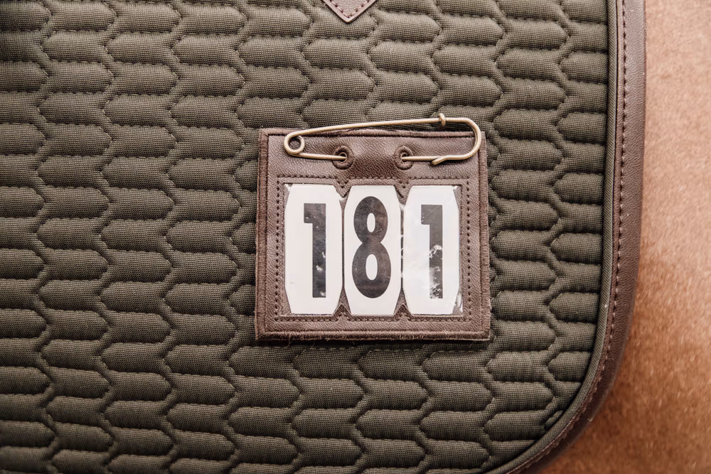 Head number PVC with safety pin brown