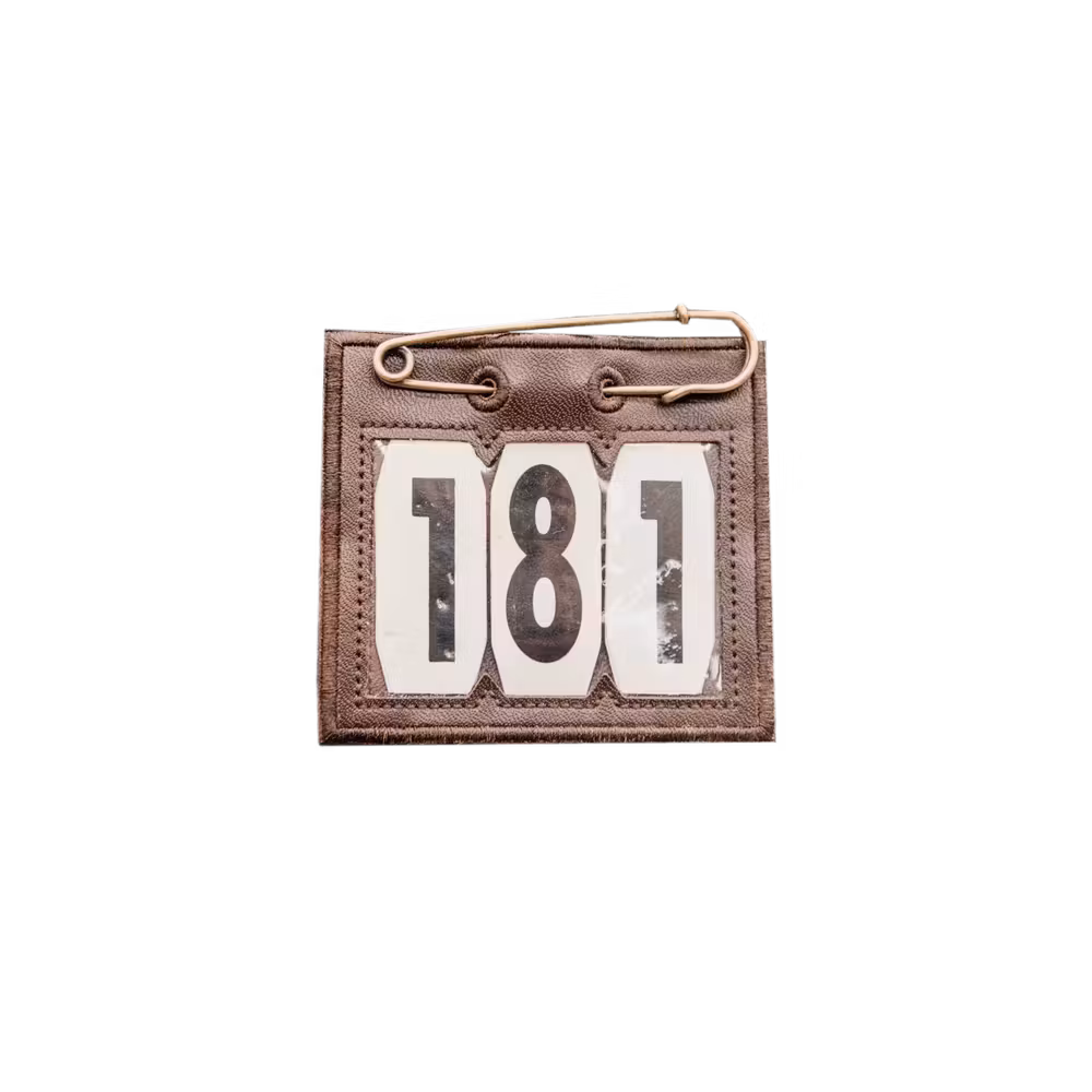 Head number PVC with safety pin brown
