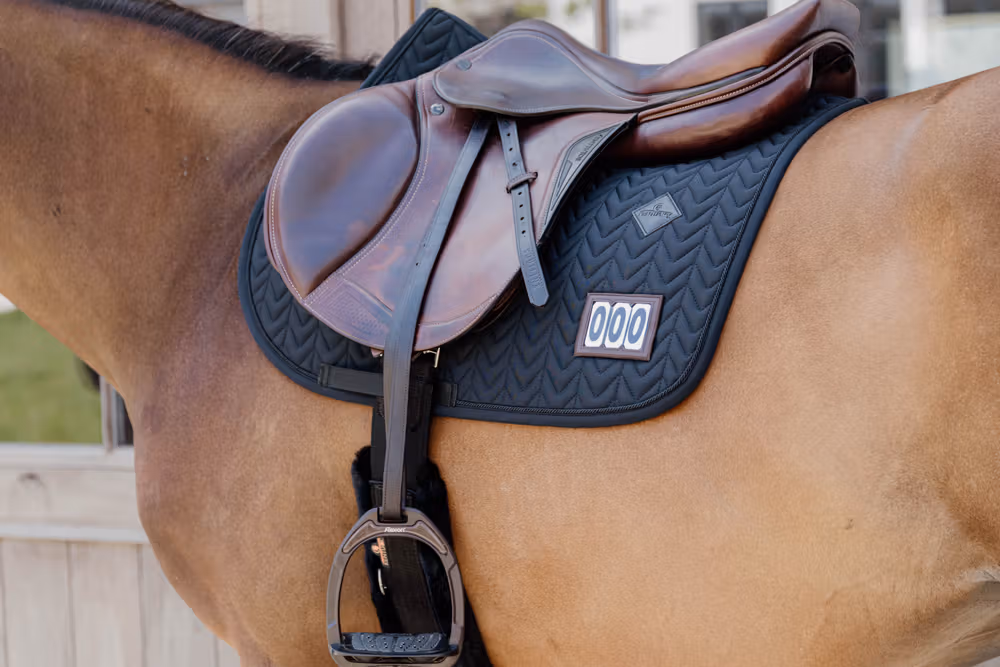 Saddle Pad fishbone competiton with 2 numbers show jumping black