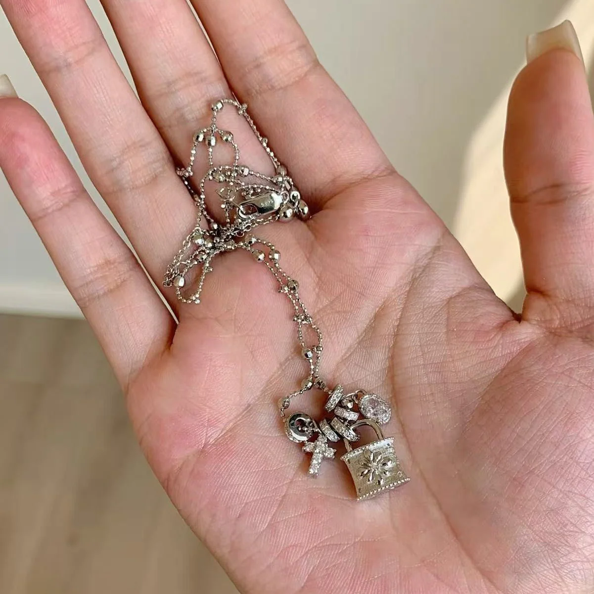 Wire drawing craft running ring cross lock bag necklace