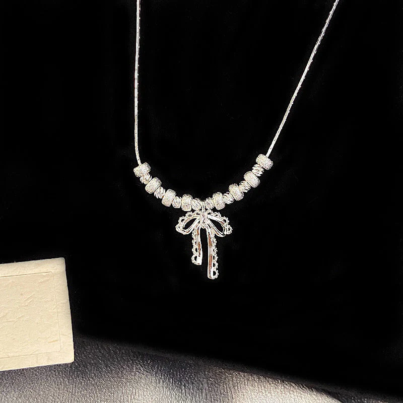 Bow openwork lace thick silver beaded pendant necklace  earrings set