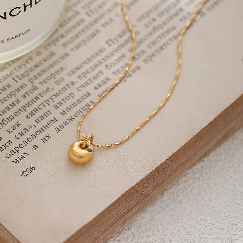 Emerald zircon necklace sand gold earrings