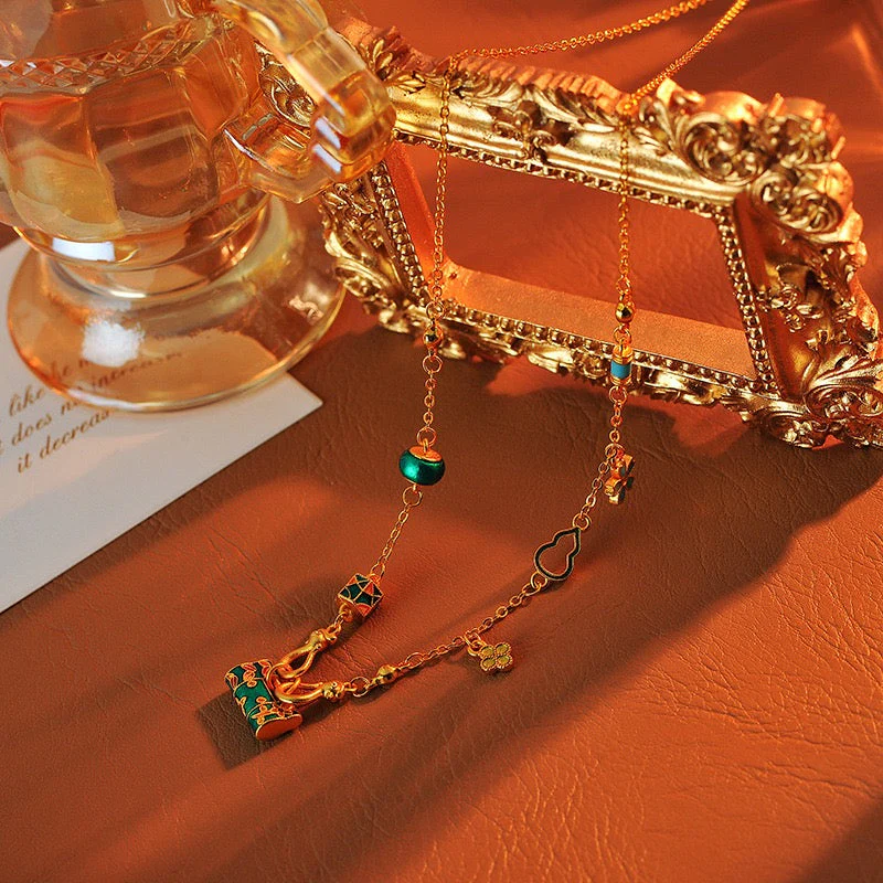 Gold burning blue enamel lock bag necklace