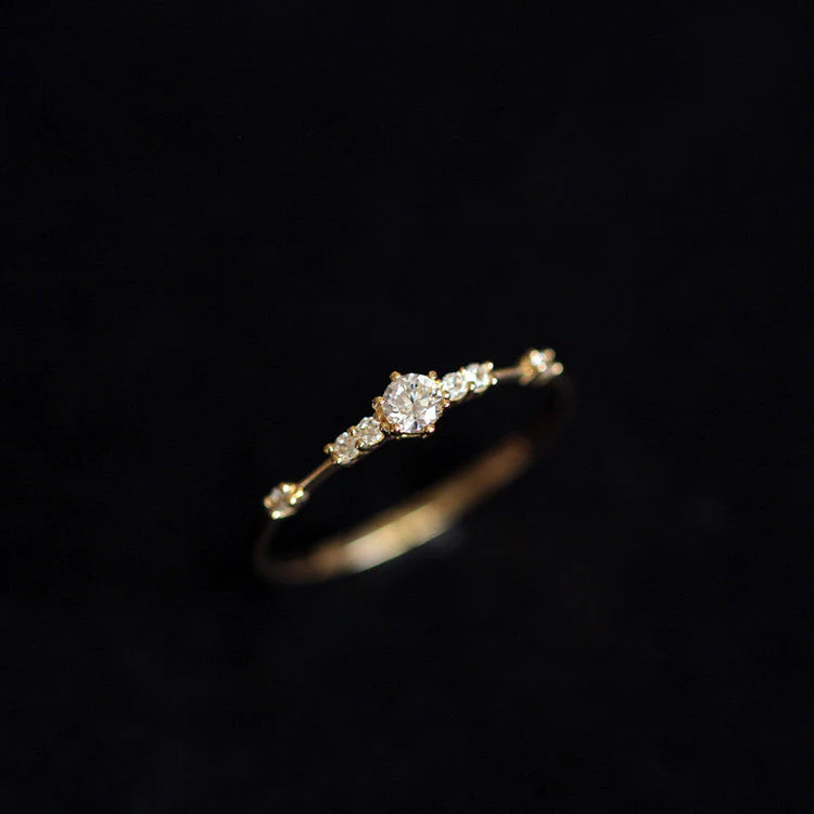S925 sterling silver plated with 14K gold 7 tiny diamond rings