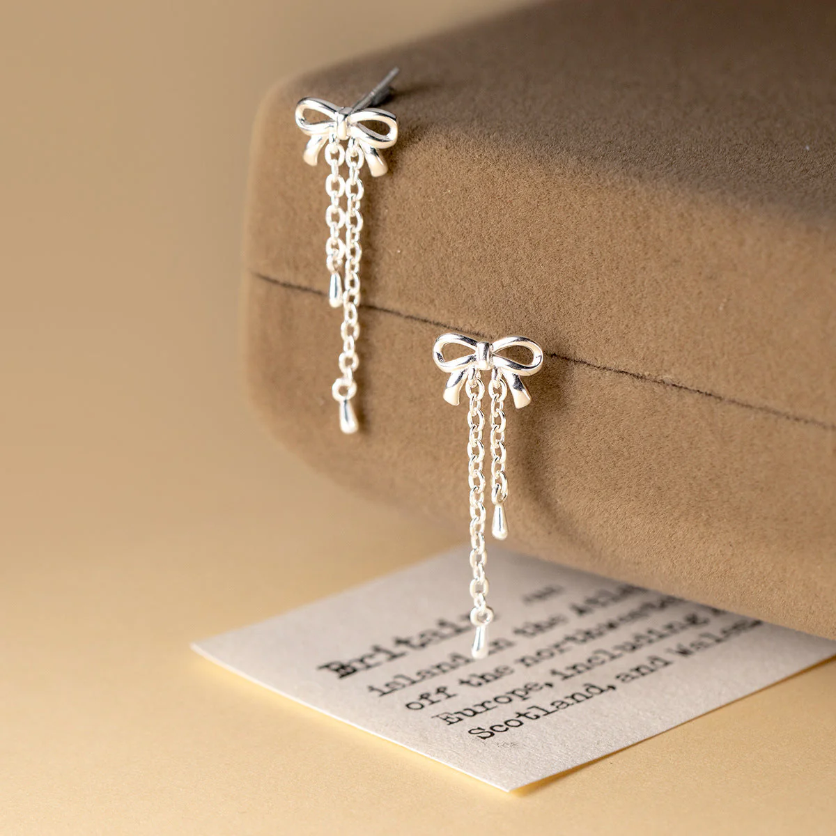 S925 sterling silver bow tassel earrings