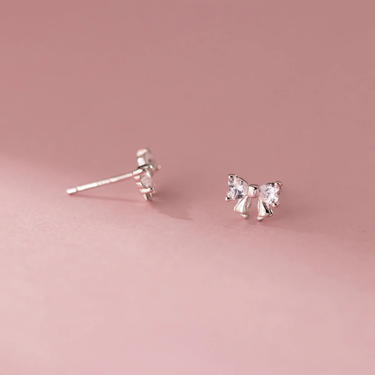 S925 sterling silver studded bow earrings