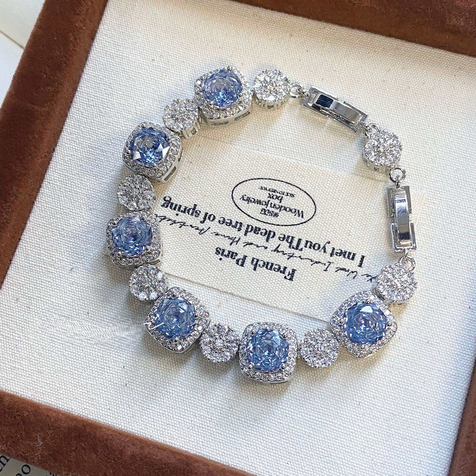 Blue bracelet inlaid with high carbon diamond rose.