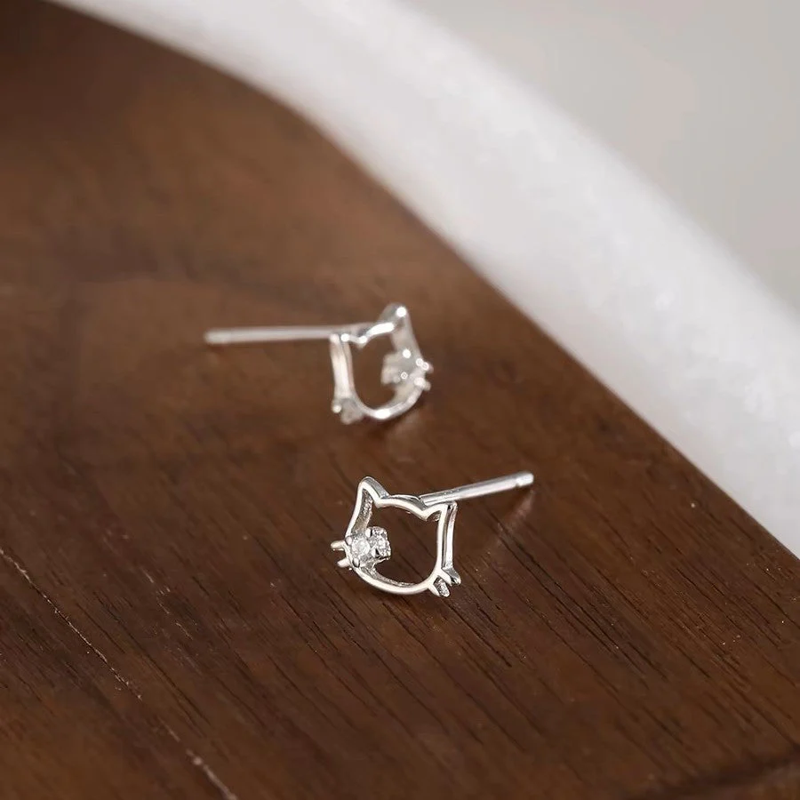 S999 sterling silver hollow cat ear nail earrings