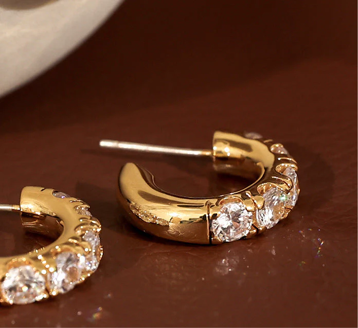 zircon inlaid C- shaped glossy earrings