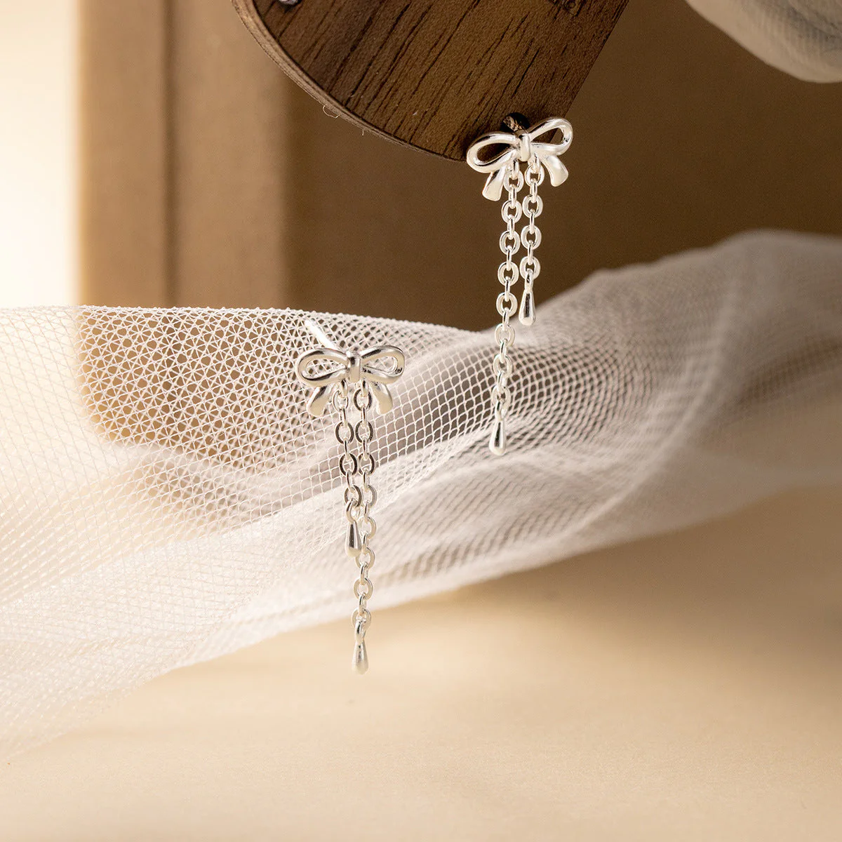 S925 sterling silver bow tassel earrings