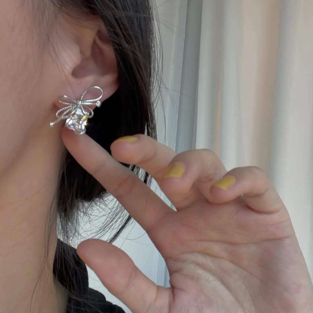 Diablo lava bow diamond zircon earrings