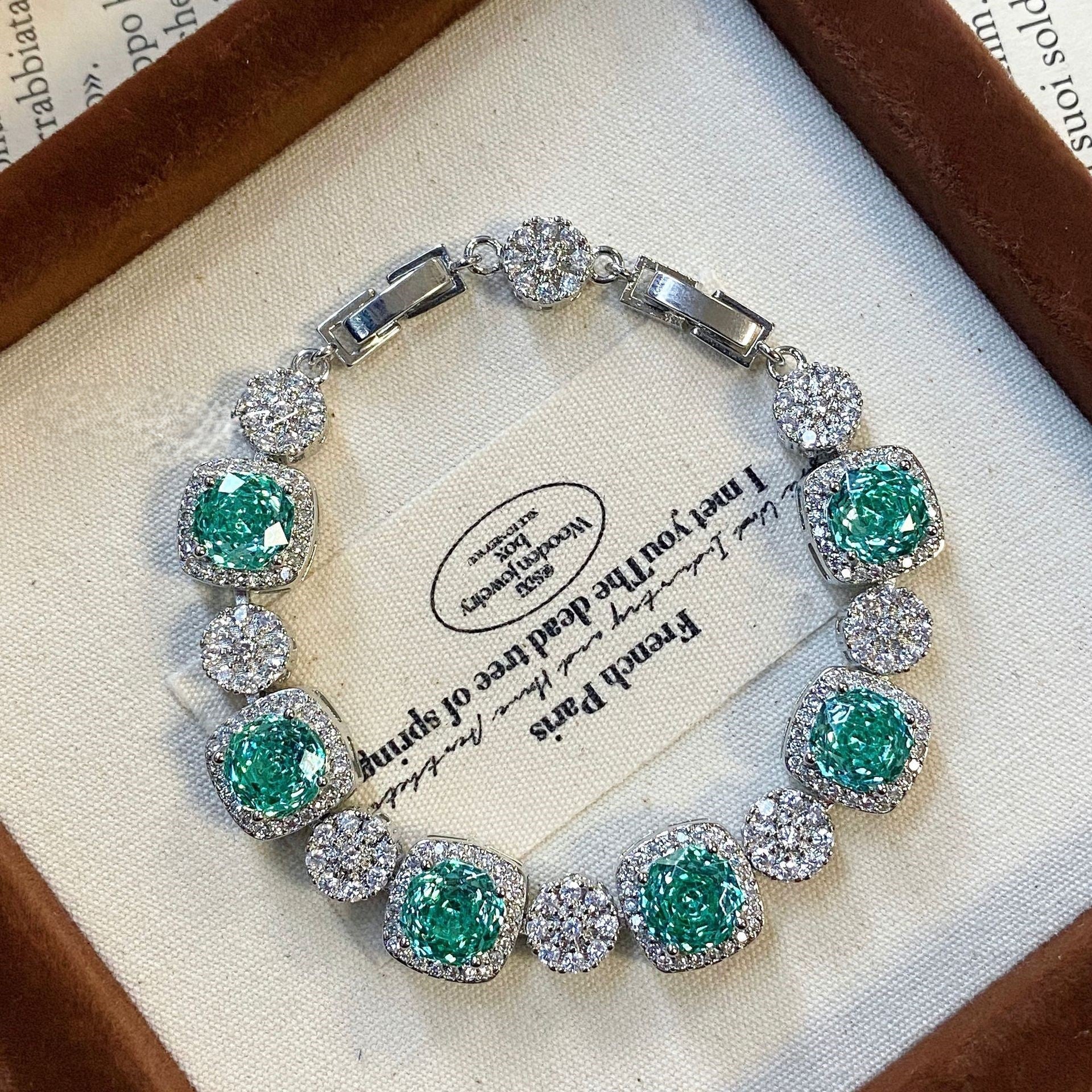 Blue bracelet inlaid with high carbon diamond rose.