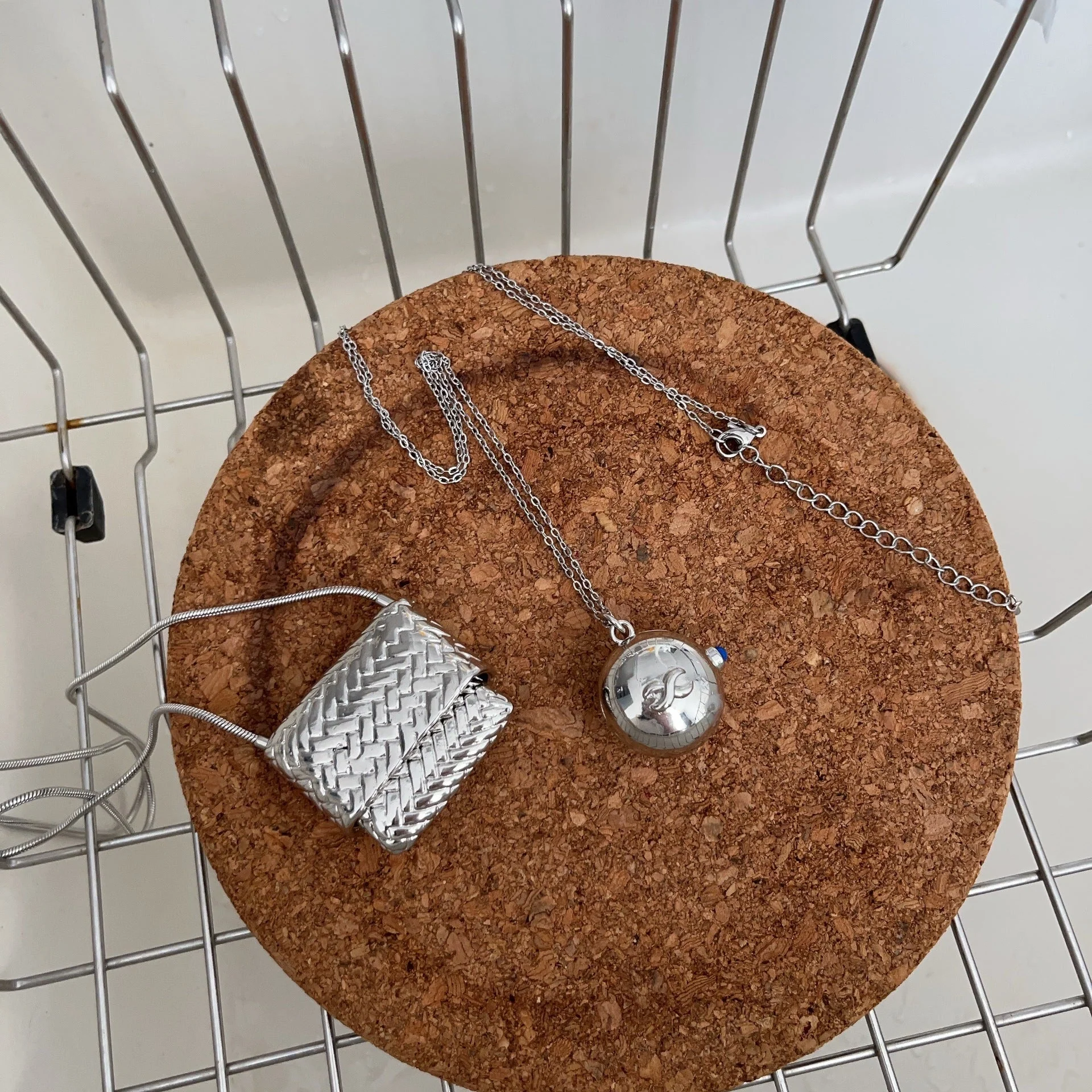 Silver braided bag necklace