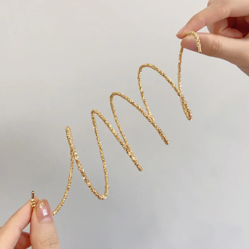 Multi-layered elastic cuff bracelet.