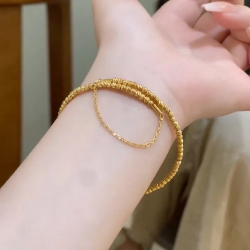 Multi-layered elastic cuff bracelet.