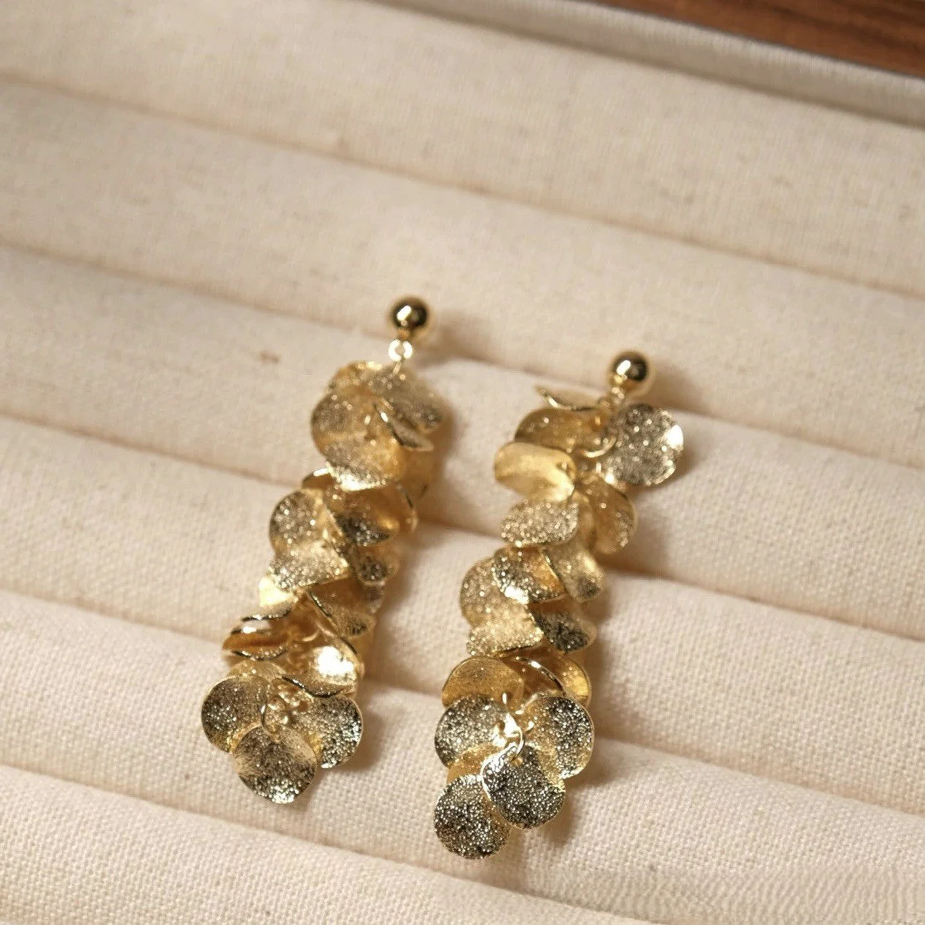 Gold-plated tassel leaf earrings