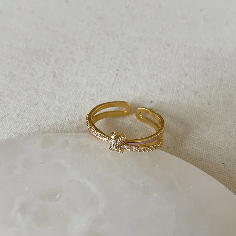 Dropping butterfly flower opening ring