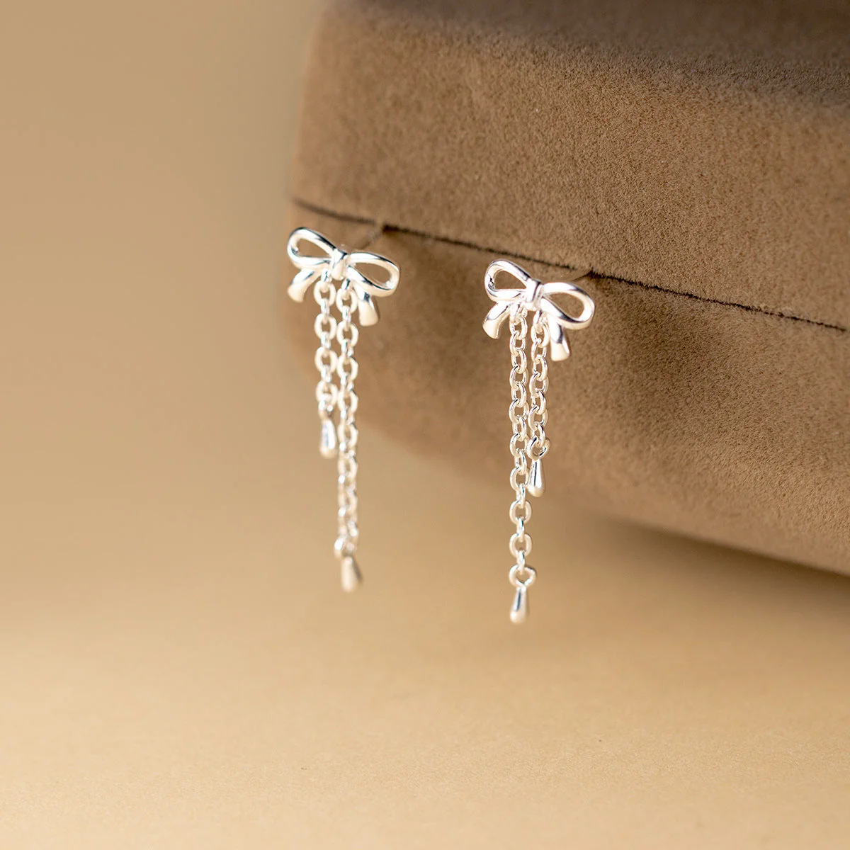 S925 sterling silver bow tassel earrings