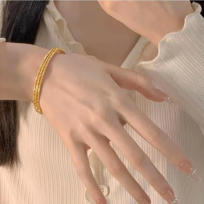 Multi-layered elastic cuff bracelet.