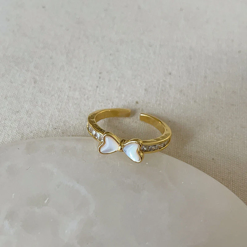 Dropping butterfly flower opening ring