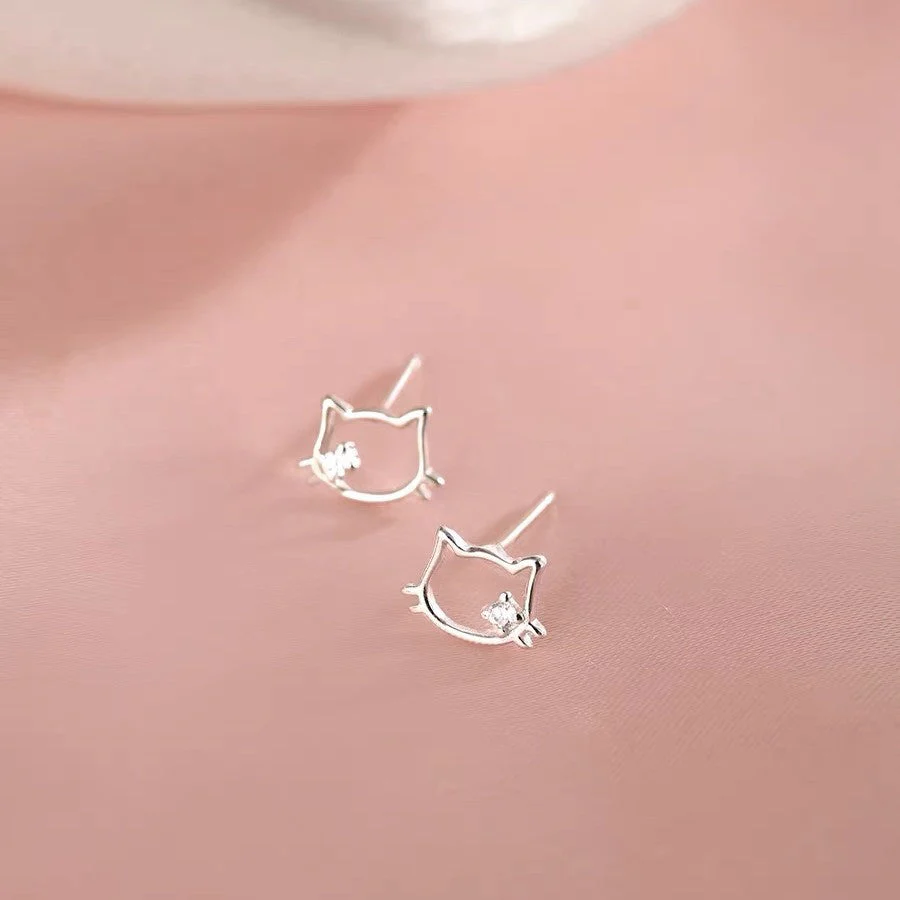 S999 sterling silver hollow cat ear nail earrings