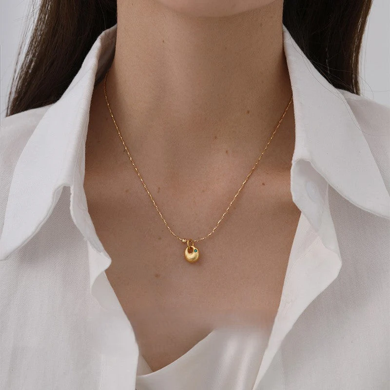 Emerald zircon necklace sand gold earrings