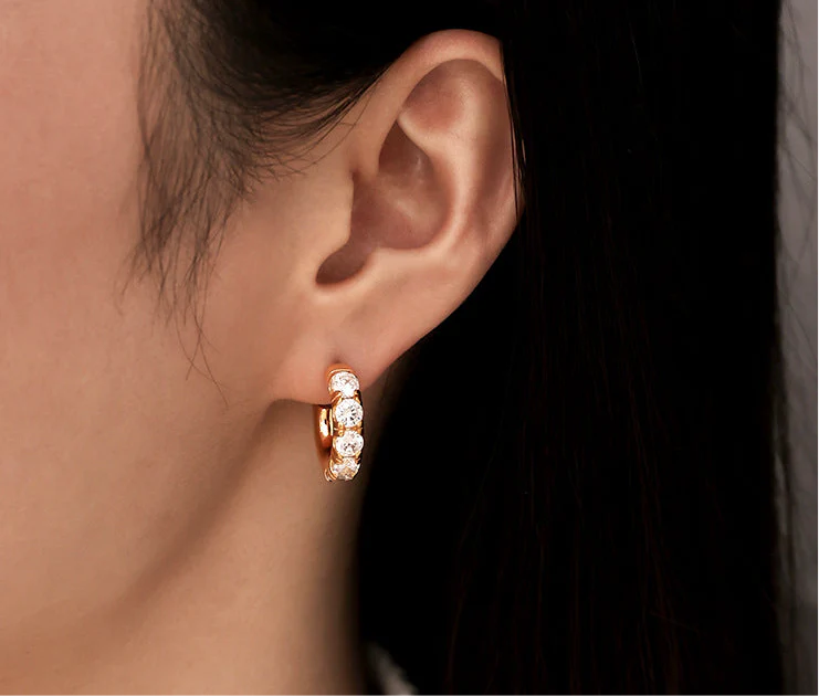 zircon inlaid C- shaped glossy earrings