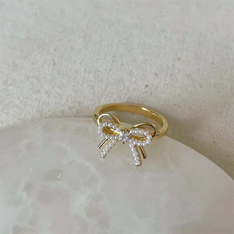 Dropping butterfly flower opening ring