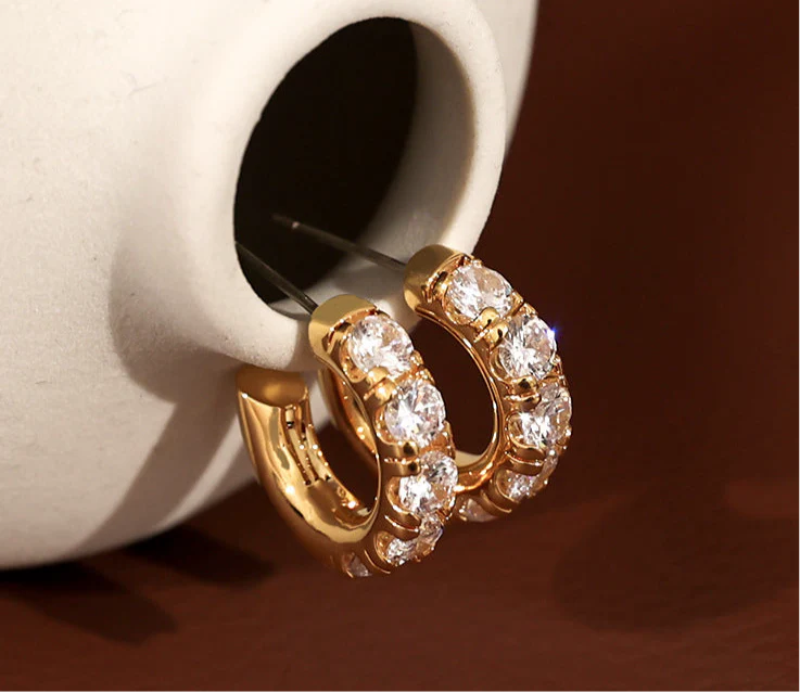 zircon inlaid C- shaped glossy earrings